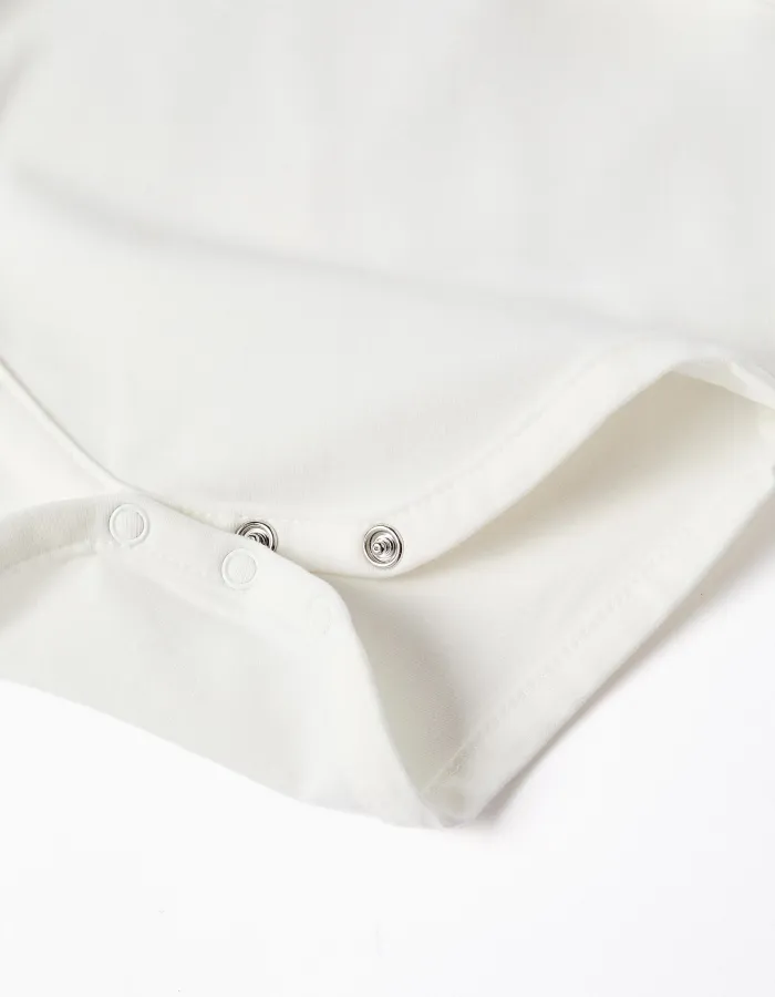 Long sleeve bodysuit with rainbow print for newborn girls, white