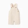 Dobby cotton dungarees with pockets for baby boys, light beige