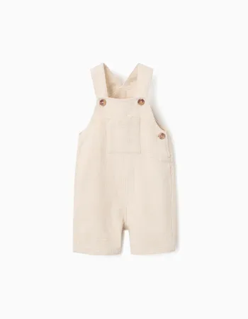 Dobby cotton dungarees with pockets for baby boys, light beige