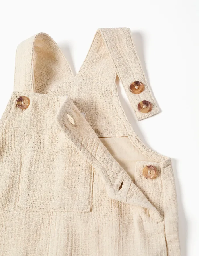 Dobby cotton dungarees with pockets for baby boys, light beige