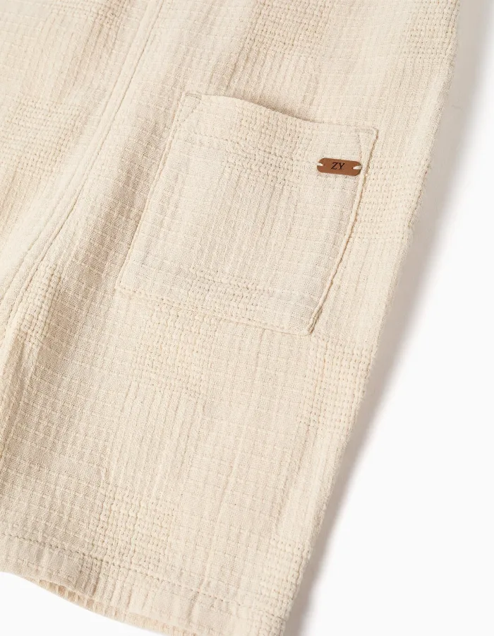 Dobby cotton dungarees with pockets for baby boys, light beige