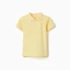 Short sleeve cotton piqué polo shirt for baby boys, yellow