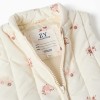 Padded vest with floral pattern and pockets for baby girls, light beige