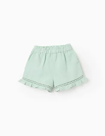 Shorts in cotton and linen with ruffled hem for baby girls, light green