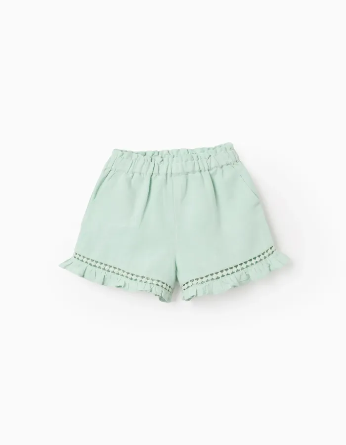 Shorts in cotton and linen with ruffled hem for baby girls, light green