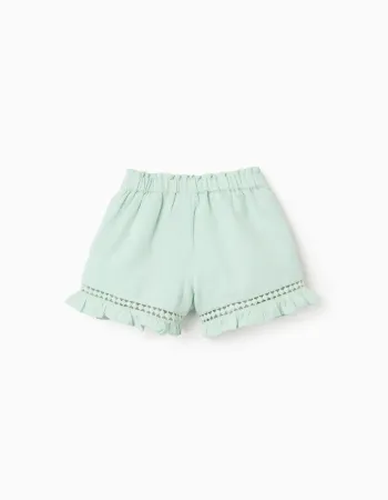 Shorts in cotton and linen with ruffled hem for baby girls, light green