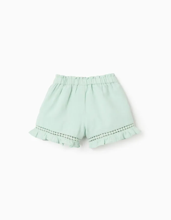 Shorts in cotton and linen with ruffled hem for baby girls, light green