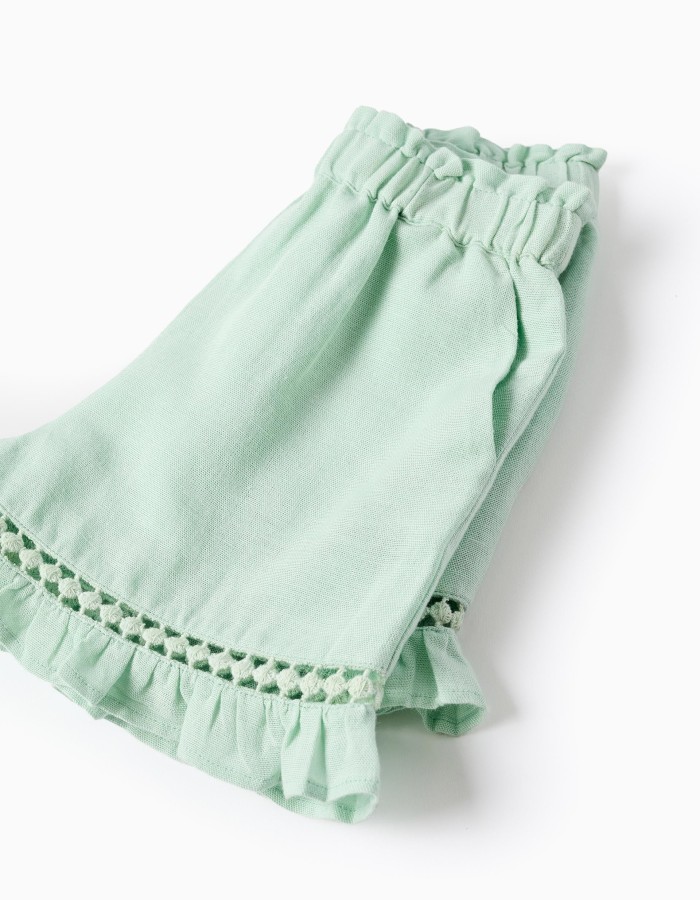 Shorts in cotton and linen with ruffled hem for baby girls, light green