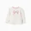 Knitted jumper with jacquard bow for baby girls, white/pink