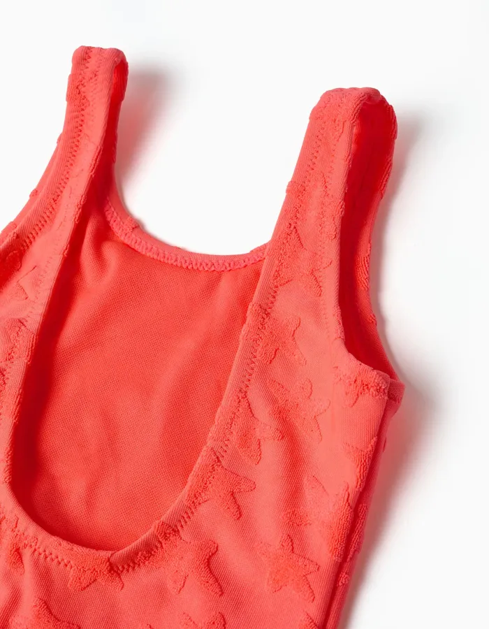 Swimsuit with star motif in bouclé for baby girls, neon coral
