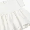 Cotton T-shirt with ruffled base for baby girls, white