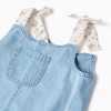 Denim playsuit with floral straps for baby girls, light blue