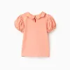 Cotton T-shirt with embroidered flowers for baby girls, salmon orange