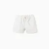 Twill shorts with broderie anglaise for baby girls, light beige