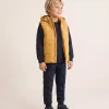 Hooded puffer vest with front zip for children, mustard yellow
