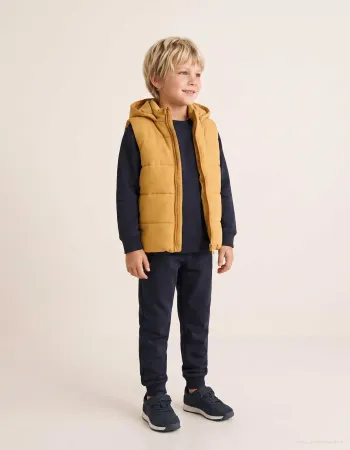 Hooded puffer vest with front zip for children, mustard yellow