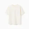 Cotton T-shirt with Normal is Boring print for boys, light beige