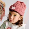 Thick cable knit beanie for girls, dark pink