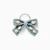 Hair bobble with bow and cowrie shells for girls, light green