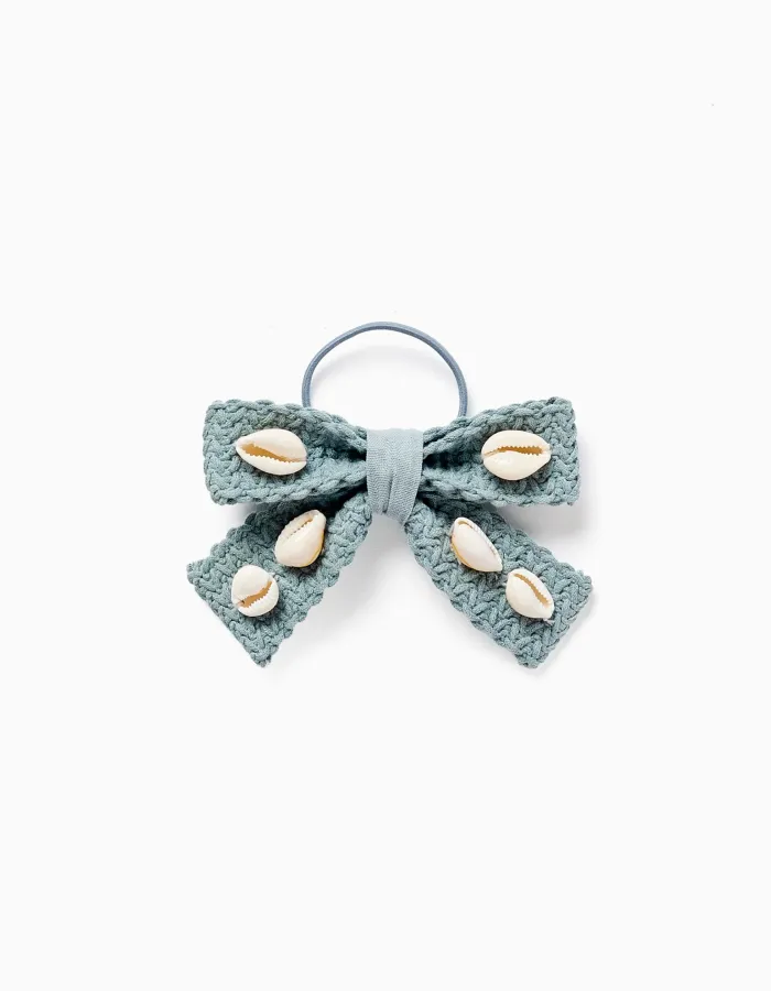 Hair bobble with bow and cowrie shells for girls, light green