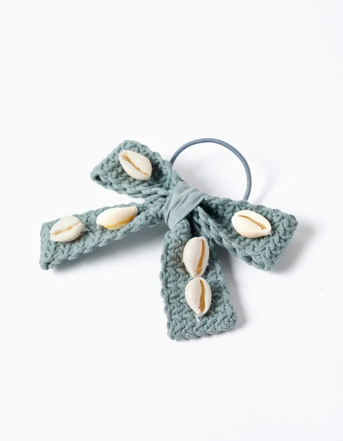 Hair bobble with bow and cowrie shells for girls, light green