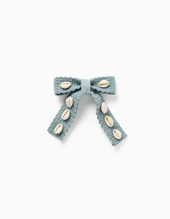 Hair slide with bow and cowrie shells for girls, light green