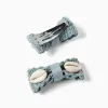 Pack of 2 hair clips with cowrie shells for babies and girls, green