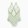 Swimsuit with Motif and Ruffles for Girls, Beige/Green