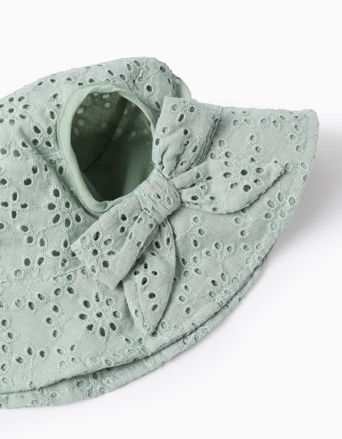 Cotton hat with broderie anglaise for babies and girls, light green