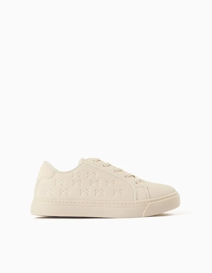 Trainers with embossed bows and elastic laces for girls, beige