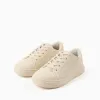 Trainers with embossed bows and elastic laces for girls, beige