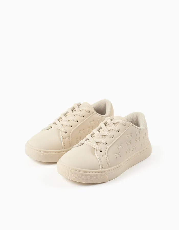Trainers with embossed bows and elastic laces for girls, beige