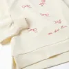 Sweatshirt with embossed print Arts for girls, white/pink