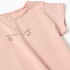 Cotton T-shirt with print and ruffled hem for girls, light pink