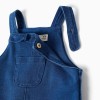 Denim pinafore dress with ruffles for newborn girls, blue