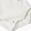 Long sleeve cotton bodysuit with ruffles for newborn girls, white