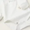 Bodysuit with Peter Pan Collar and Ruffles for Newborn Girls 'Blooming', White