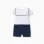 Cotton piqué romper with Mickey for newborn boys, white/dark blue