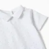 Cotton bodysuit with pattern for newborn boys, white/light blue