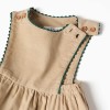 Corduroy pinafore dress with pockets for newborn girls, beige