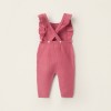 Knitted jumpsuit with ruffles for newborn girls, pink
