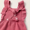 Knitted jumpsuit with ruffles for newborn girls, pink
