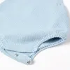Cotton knitted romper with adjustable straps for newborns, light blue