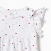 Ribbed romper with heart motif for newborn and baby girls, white
