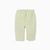 Trousers with plush lining for newborn girls, light green