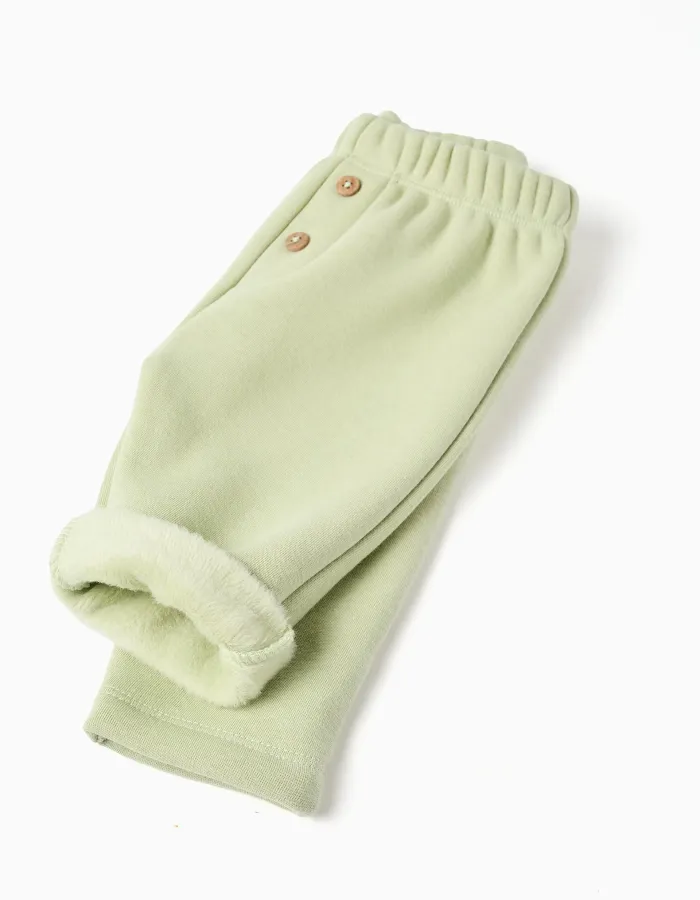 Trousers with plush lining for newborn girls, light green