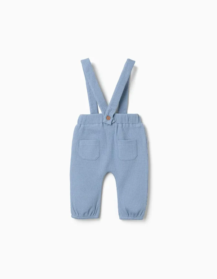 Waffle‑textured cotton trousers with straps for newborn boys, blue