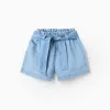 Denim shorts with paperbag waist and belt for baby girls, blue