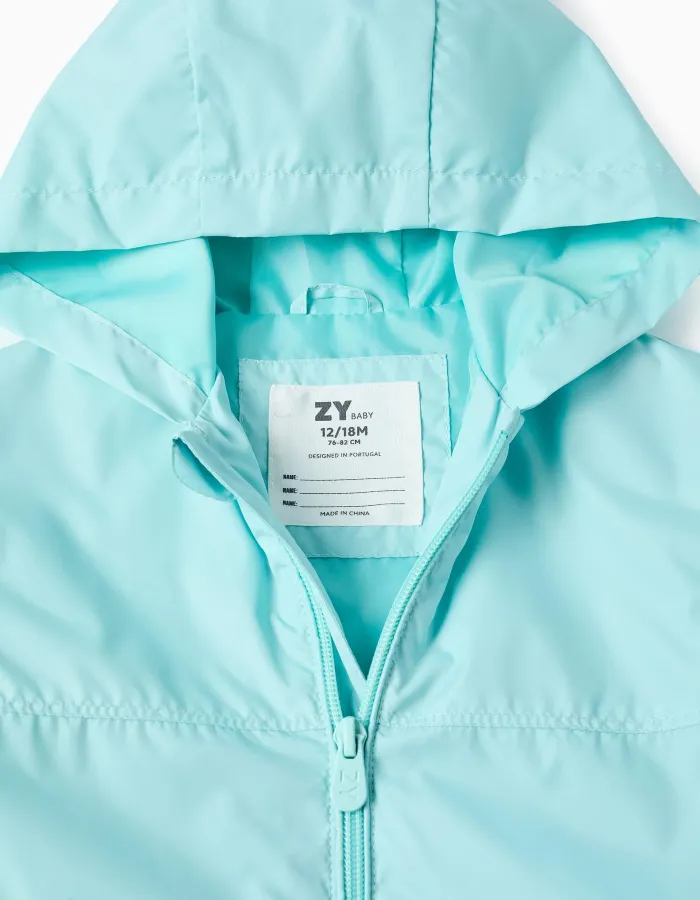Hooded windbreaker with lining for baby girls, turquoise blue
