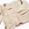Knitted jacket with crochet and ruffles B&S for baby girls, beige